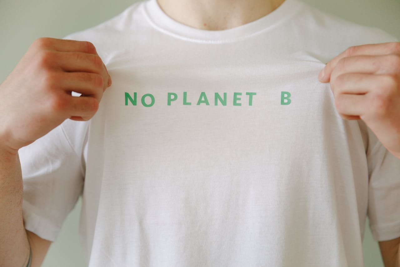 White t-shirt with No Planet B slogan promoting environmental awareness.